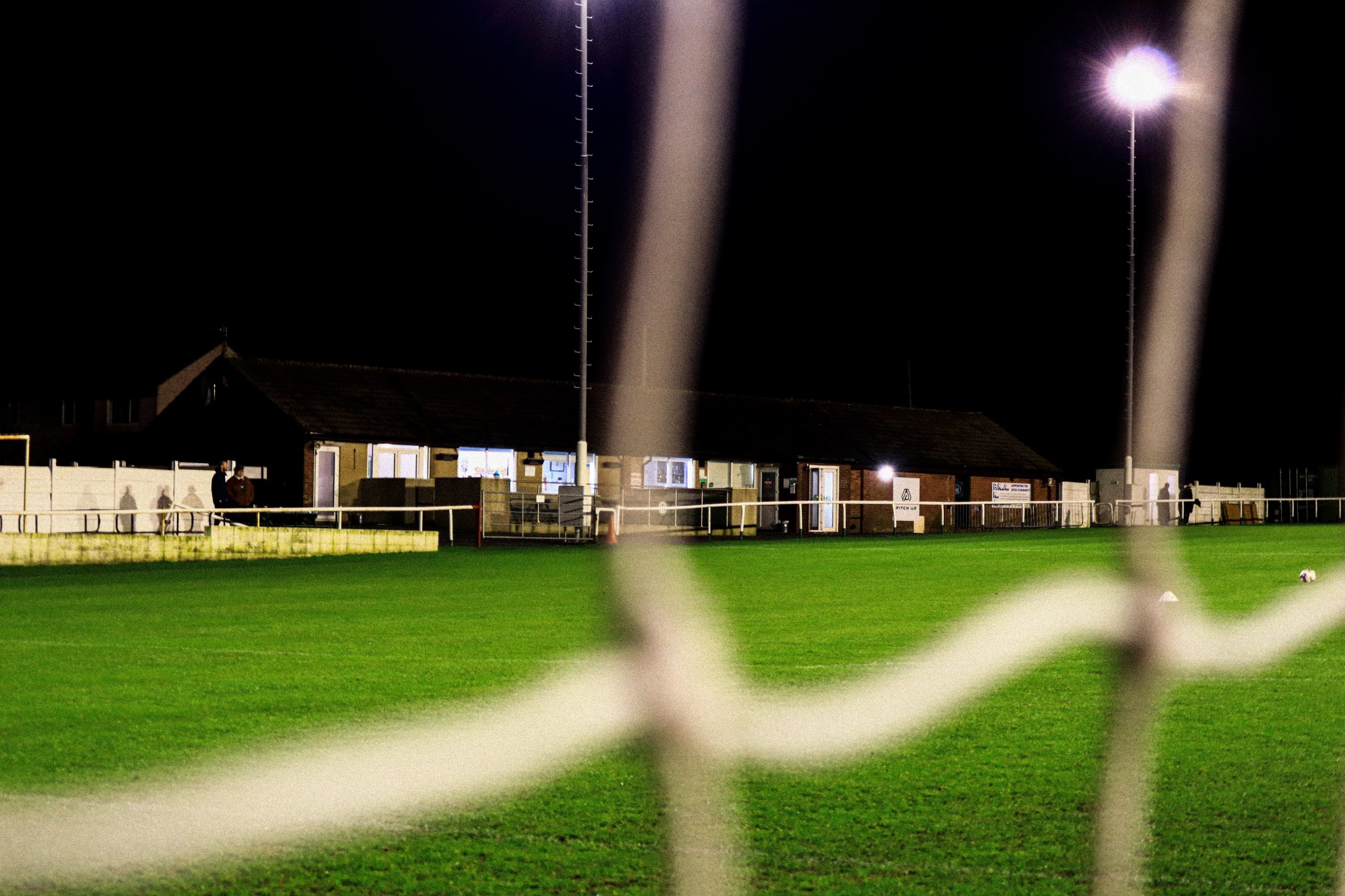 clubhouse through net at night